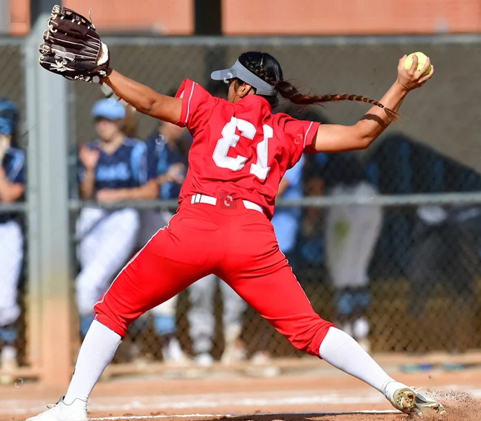 Girl throwing softball